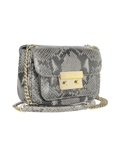 michael kors blue snakeskin bag|Michael Kors embossed bag.